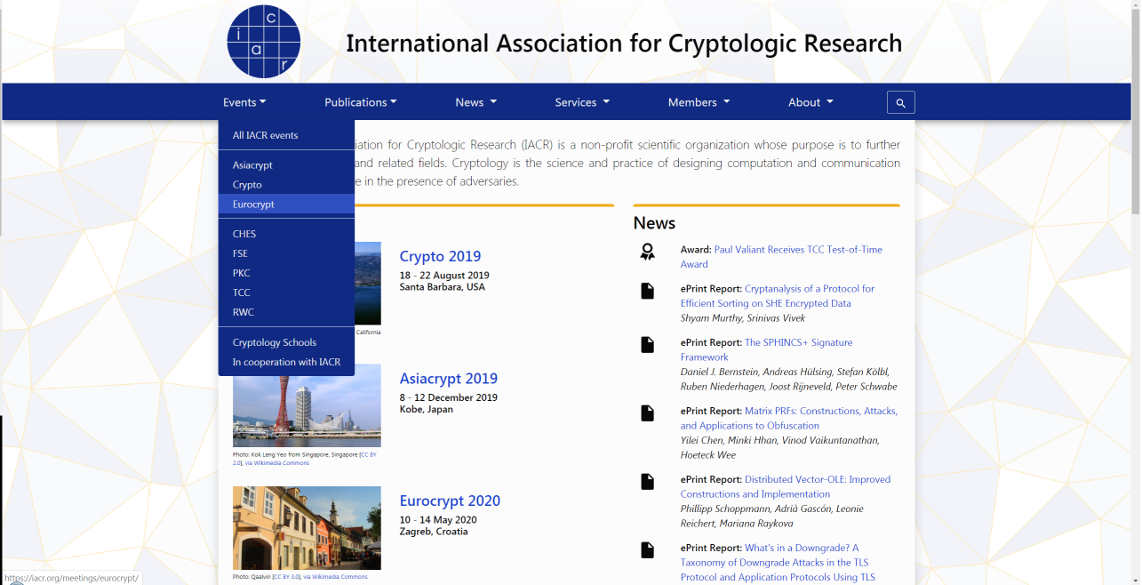 Screenshot of the main IACR website. There is a dark blue menu that is open. The background is pale gray triangles with faint orange outlines.